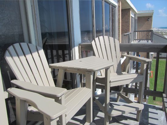 Deck with chairs Deck with a view of the Gulf Coast